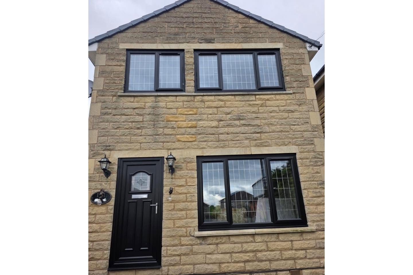 House front with new anthracite windows and composite door